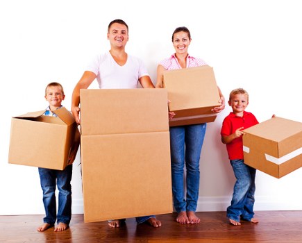 Packing boxes and household items for a move in Catford