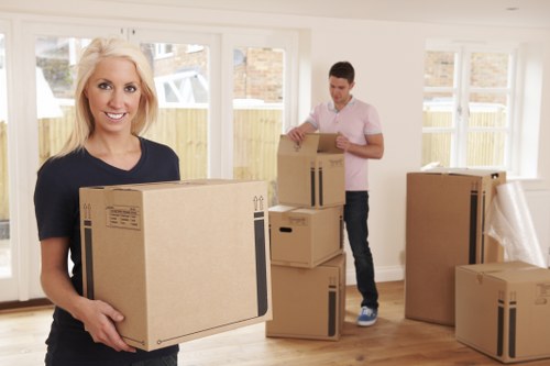 Flat removals team loading furniture in Catford