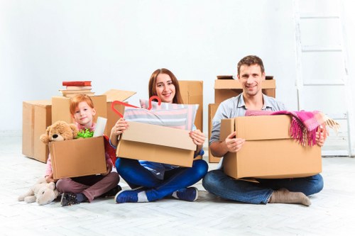 Unpacking boxes in a new Catford home after moving day