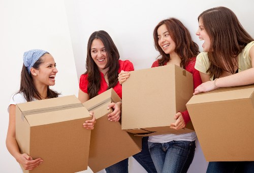 Loading boxes and furniture into a removal truck